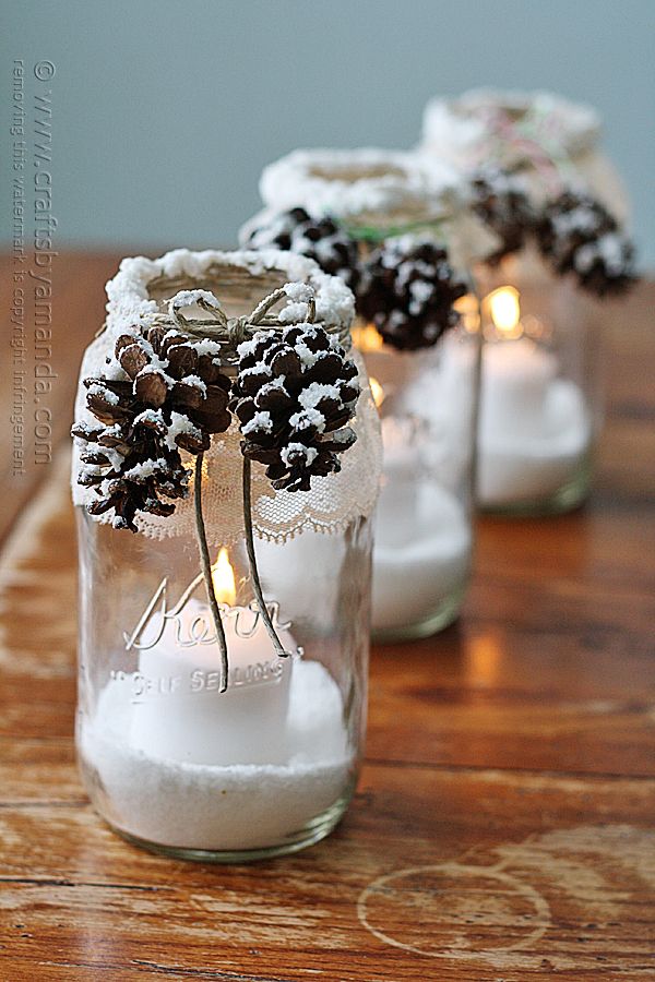 Frosty Pinecone Candle Jars-20 Beautiful DIY Pinecone Craft Projects For Christmas Decoration