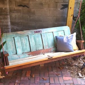 Unexpected Ways to Re-purpose Old Doors Into New Furniture